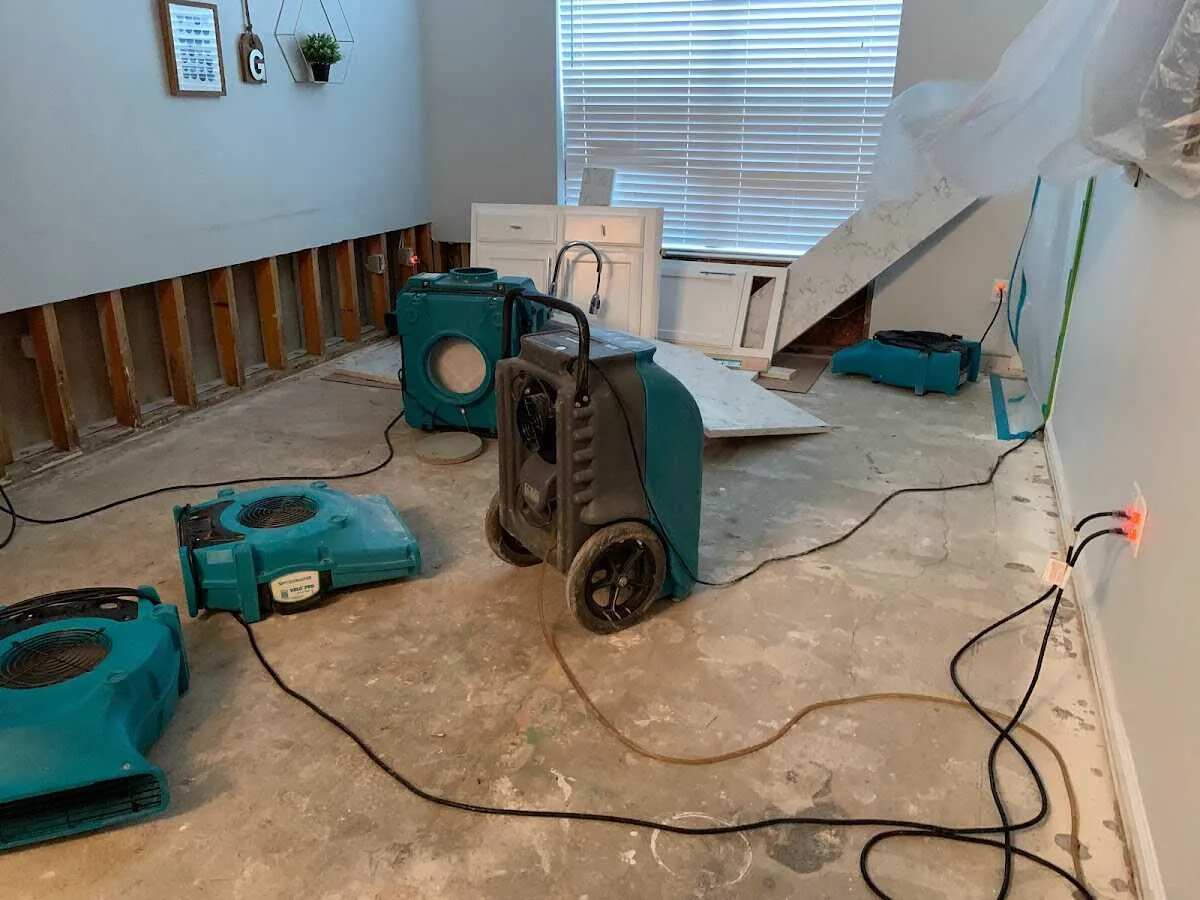 Dehumidifier in flood-cut room for Water Damage Restoration in Sugar Grove